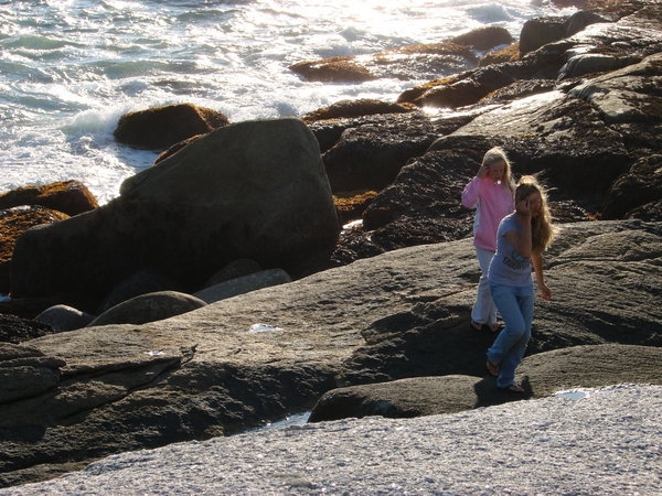 climbing the rocks near Peggy's Cove