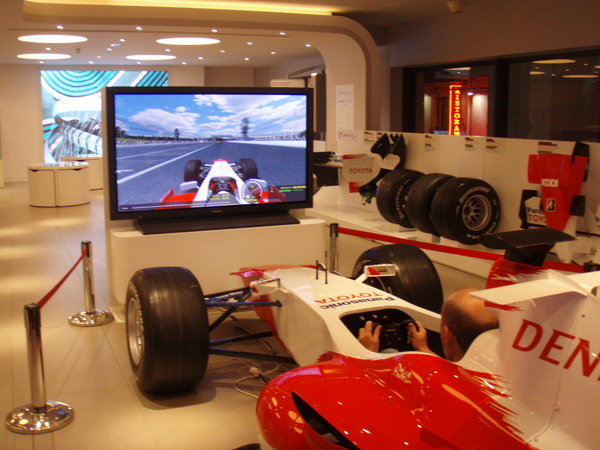 Martin on a F1 simulator in the Toyota Showroom in Paris