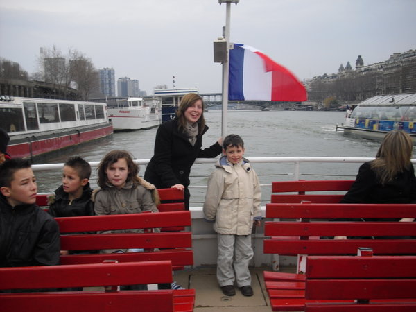 host cousin and I on the boat in Paris