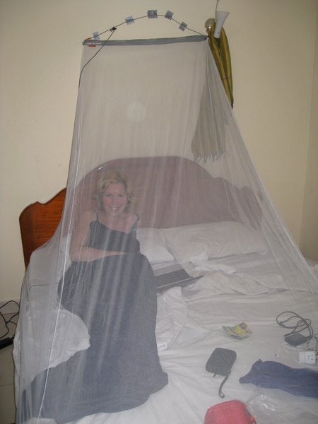 Our First Mosquito Net. The Instructions Said Something About Hanging It Up, But We Opted For The 'Just Stick It To The Wall With Loads Of Tape" Approach.