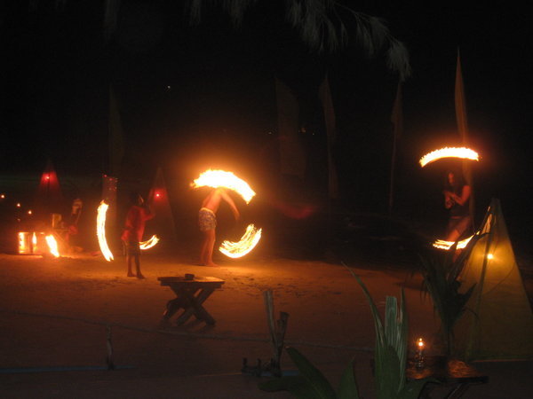 Fire Dancers On The Beach
