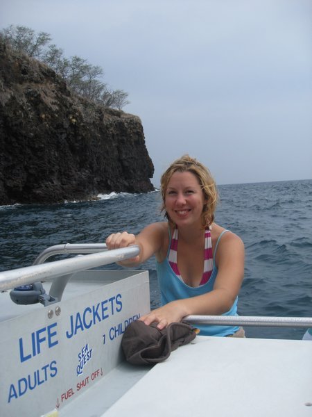 Clearly Worried By The Speedboat, Helen Kept One Hand On The Box Containing The Life Jackets