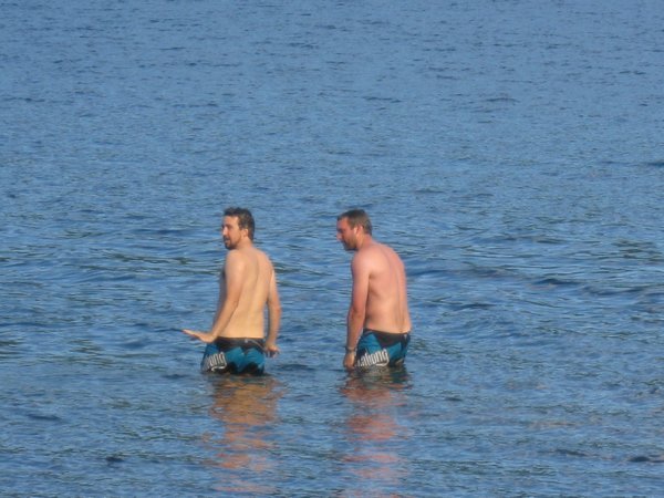 The boys have a dip in the chilly lake