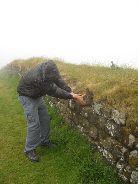 Dav taking a souvenier from Hadrians Wall