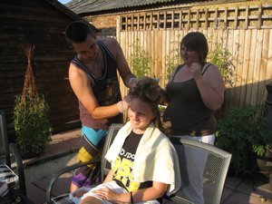 Dav's turn to mess with my hair - getting some much-needed guidance on dying hair from Anna