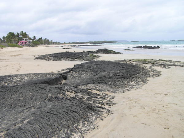 La Playa Grande with cool lava flow into the sand