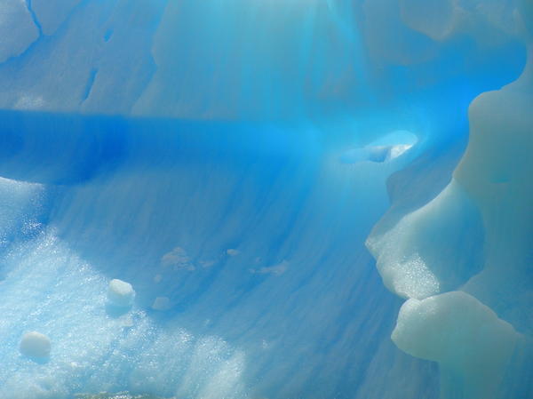 The definition of icy blue - the blue intensifies the less oxygen there is in the ice