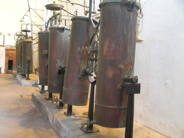 Old metal vats heated by water steam to make Port wine