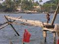 Fisherman on Chinese fishing net - Cochin