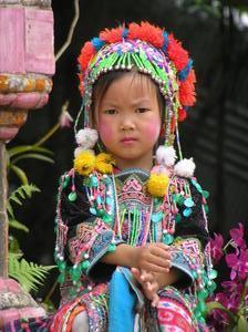 Child in traditional Thai dress at Doi Suthep