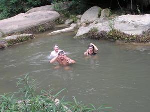 Bathing in the river to wash off 2 days of trekking.