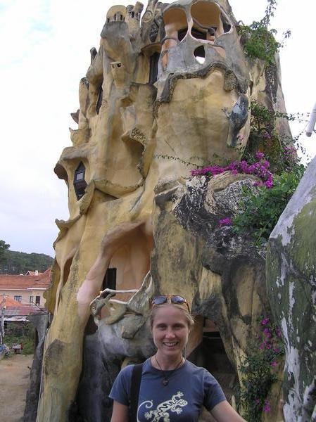 Bronia in front of one part of the 'crazy house'
