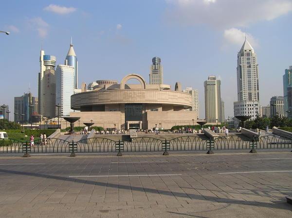 The circular Shanghai Museum surrounded by modern city development