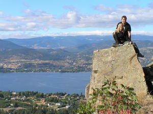 Dave & Bronia perched on a rock high above Okanagan lake