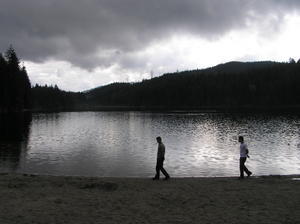 Silhouettes of Dave & Kostia on a day with heavy grey skies at "Sasamat" Lake - where our female cat gets her name.
