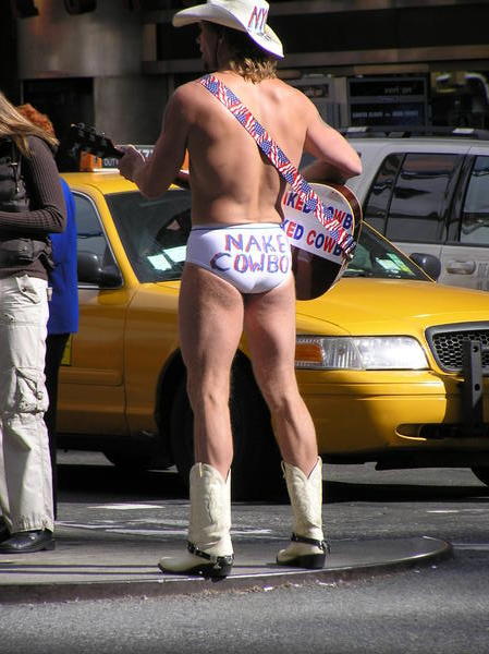 The Naked Cowboy stands here rain or shine - in his underpants!
