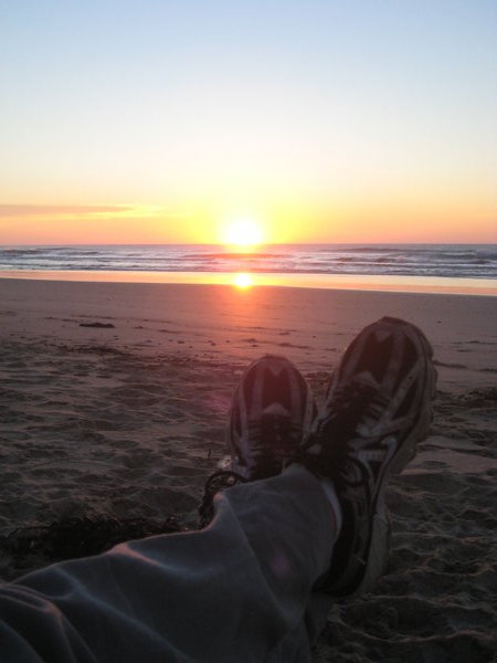 My feet with the sunrise
