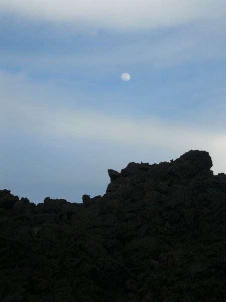 Moon over lava field