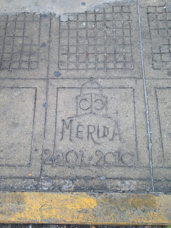 stamped in the sidewalk