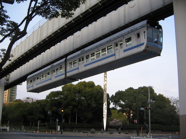 It is a suspended monorail!
