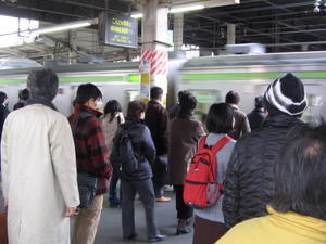 Orderly Japaneses queuing up at the train platform