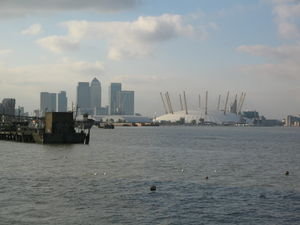 View of Canary Wharf and O2 from the Thames Barrier side