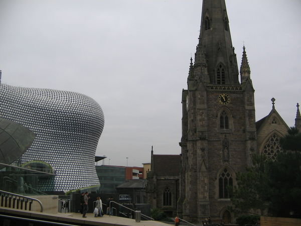 The interesting contrast between modern Bullring and gothic St Martin Church