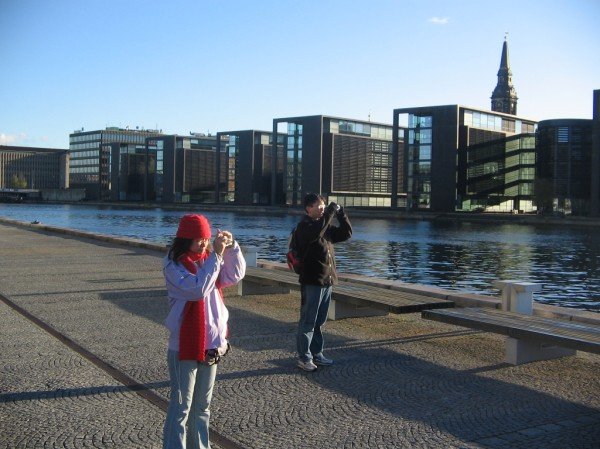 Elsa and Jieli taking photos beside the harbour