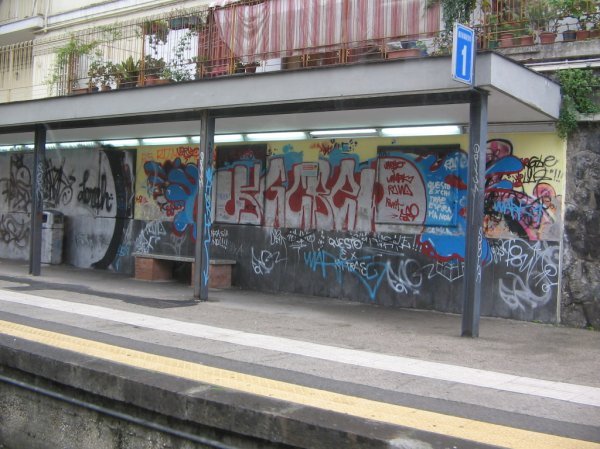 A graffiti-covered station
