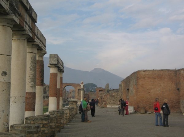The view of Mount Vesuvius is a reminder of its strong destructive force that buried this Roman town
