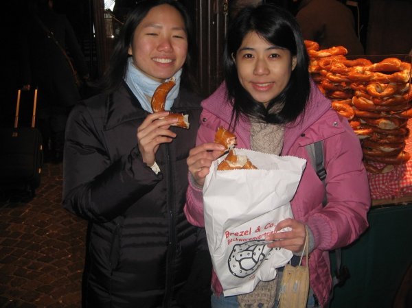 Yingyi & Carine with a packet of pretzels