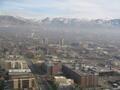 View of SLC and the surrounding snow-capped mountains from the top of the office tower