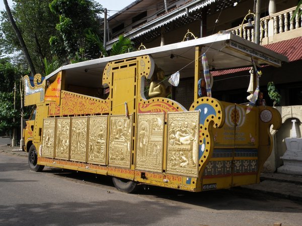 A decorated vehicle outside Gangaramaya temple