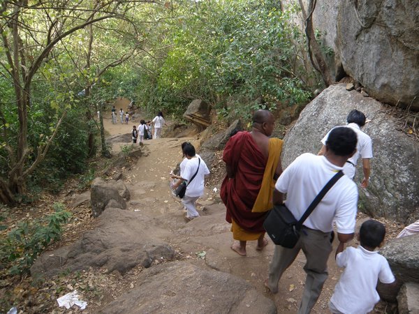 Going down a long flight of stairs (barefooted!) to the holy cave