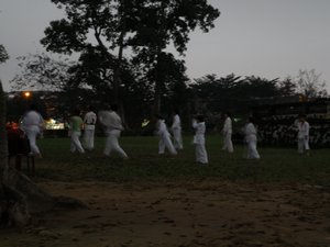 A group of children learning martial arts