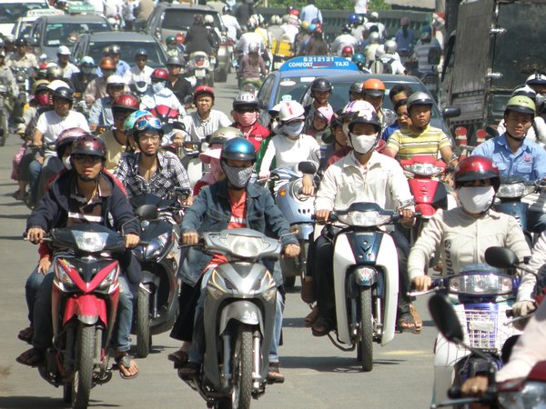 Traffic in Ho Chi Minh City (It takes a lot of courage and experience to cross a road like this)