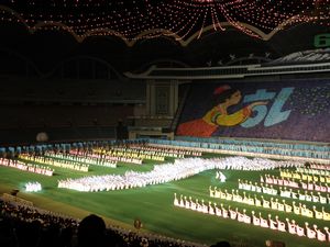 Performers forming the shape of Korean peninsula