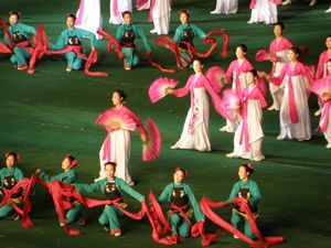 Dancers in Korean and Chinese costumes