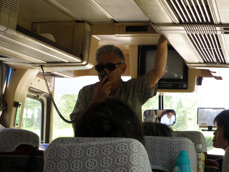Our fellow tour group member (the Chinese veteran) sharing his experiences during the Korean War