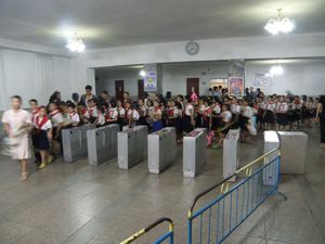 School-children entering the metro station