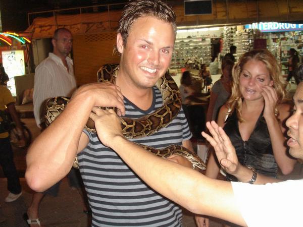 Remi holds a python