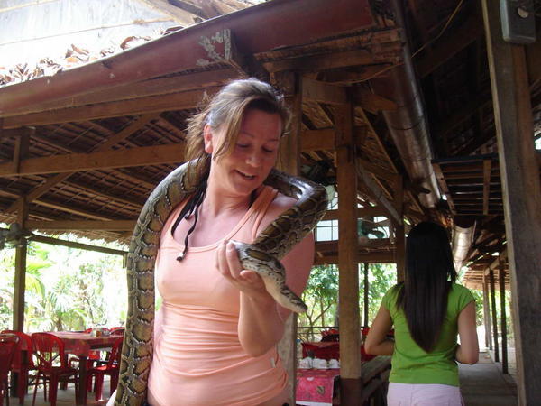 Anne-Line holding a python