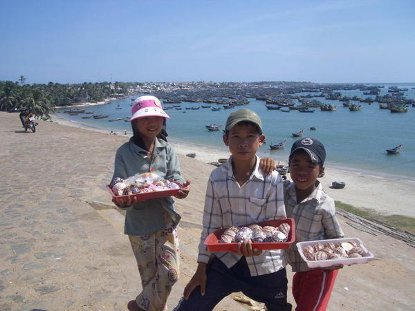 Kids at fishing vessel bay