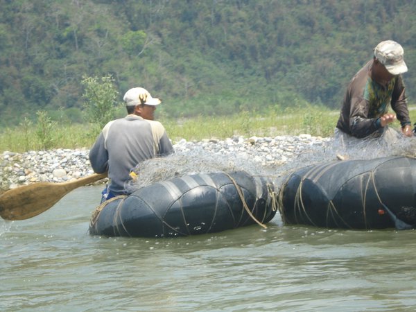 fishermen in rubber tubes
