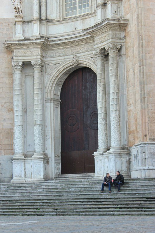 on the steps of the Cathedral