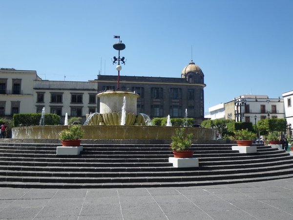 One of the squares with fountain