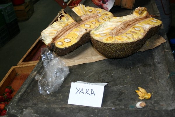 Yaka fruit - you scoop out the fleshy seed, throw the seed away, and eat the rest
