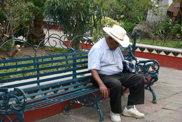 Man sleeping on bench in Chapala square