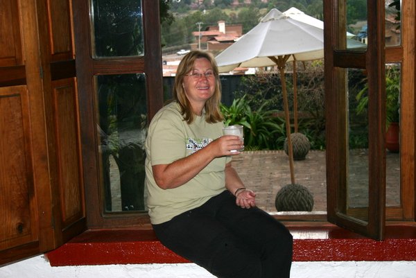 Sitting on our window ledge enjoying an evening drink