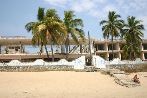 One of a whole row of abandoned hotels along the beach in Melaque